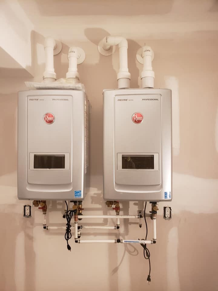 Side-by-side Rheem Prestige tankless water heaters with neat piping